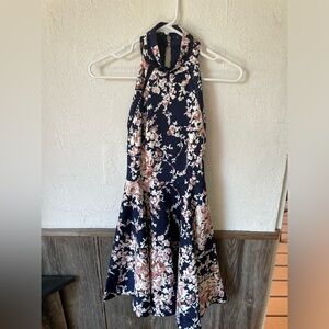 B. Darlin Dress, never been worn. Size is 1/2